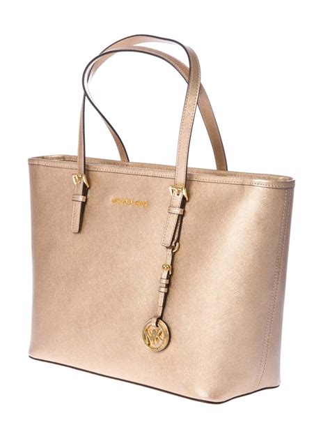 bolsa michael kors dorada original precio|bolsos Michael Kors baratos.